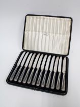 Cased set of twelve silver handled fruit knives by Walker & Hall, (12)