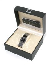 Gucci 600 Series rectangular cased stainless steel wristwatch, signed black dial and bracelet strap,
