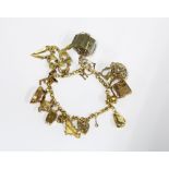 9ct gold charm bracelet with a collection of charms mostly stamped 375
