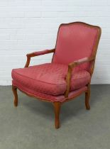 French style fruitwood and red upholstered open armchair, 73 x 94 x 55cm.