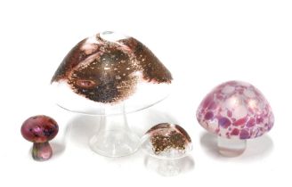 A group of four art glass toadstool mushrooms (4) 12 x 11cm.