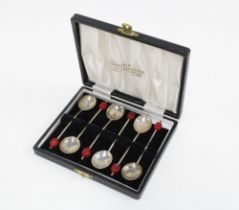 Cased set of six silver coffee bean handled spoons, Birmingham 1934 (6)