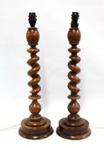 Pair of oak barley twist table lamps, 16 x 52cm. (2)