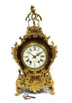 A 'Boulle' mantle clock with French brass movement, retailed by Howell & James, London, 53cm high