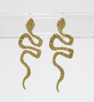 A pair of unmarked yellow metal snake earrings