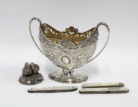 A Birmingham silver figure of two ducks, hallmarked and filled, 4cm high, a silver plated bowl with