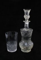 A thistle etched decanter and stopper and set of cut glass beakers, 23cm high.