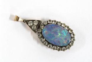 Paste set opal doublet pendant set in unmarked yellow and white metal