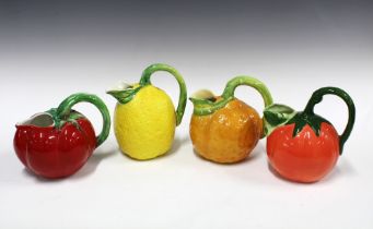 Set of four pottery fruit jugs to include a lemon, orange and tomato etc, (4) 17 x 20cm.