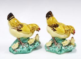 Two majolica type pottery chickens in coloured glazes (2) 11 x 13cm.