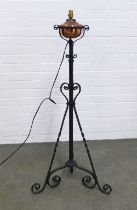 Wrought iron standard lamp with a copper well, 58 x 122cm.