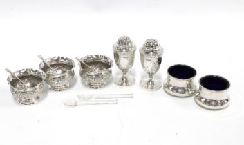 A collection of silver condiments to include salts and pepper pots (7)