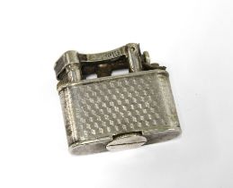 Early 20th century Dunhill lighter in white metal case, base inscribed Pat No. 143752, 3.5cm