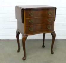 Mahogany serpentine bedside with drop leaf sides, on cabriole legs, 93 x 77 x 37cm.