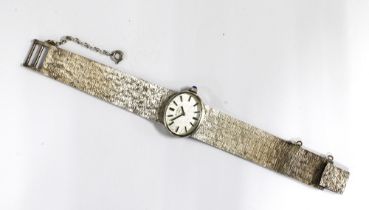 ROTARY, ladies vintage silver wristwatch on a textured silver bracelet strap, blue cabochon