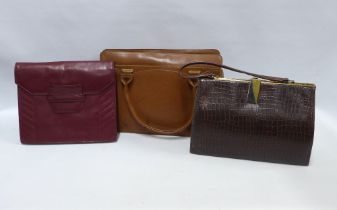 Three vintage leather handbags, largest 35 x 24cm (3)