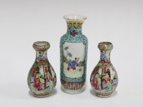 Pair of Chinese miniature famille rose vases and another of taller form, (3) 12cm.
