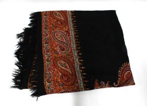 Kashmir Paisley pattern shawl, c1860, with central black ground and boteh border in coloured