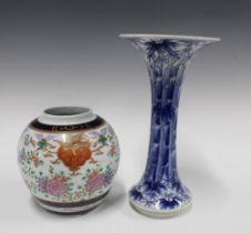 A Japanese blue and white bamboo pattern vase together with a ginger jar, taller 31cm (2) 17 x 31cm.