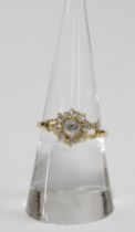 An Edwardian 18ct yellow gold diamond flowerhead ring, Chester 1903, with a nine bright cut diamonds
