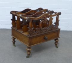 19th century rosewood Canterbury, with carved scrolls and three divisions, long drawer to the