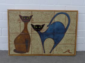 20th century tiled panel depicting two cats, signed with initial 'R', framed, 62 x 42cm.