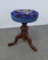 Hume family crest and tartan upholstered piano stool, 37 x 50cm.