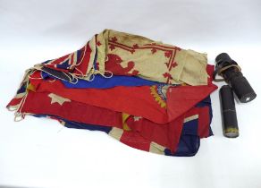 A JH Steward brass draw telescope with leather case and vintage Union Jack flag bunting