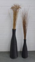 Two contemporary floor standing ribbed vases, with rushes, 90cm high. (2)