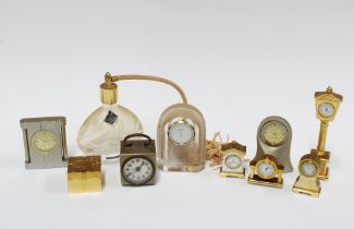 A collection of 8 miniature clocks and an Edinburgh Crystal clock and scent atomiser (10)