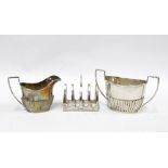 Viners silver five bar toast rack, Sheffield 1933 and a matched silver sugar bowl and cream jug,