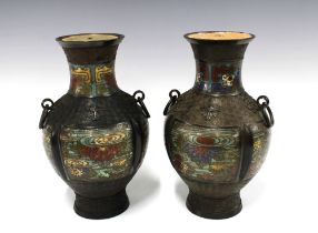 A pair of large Chinese bronze and champleve vases, archaic form with ring loops to the shoulders,
