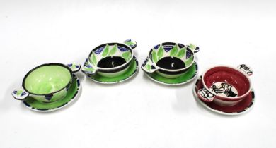 A set of three Bough Scottish Pottery quaich complete with stands, painted in black, green and