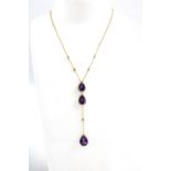 18ct gold amethyst and diamond pendant necklace, set with three pear shaped amethysts within a