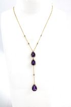 18ct gold amethyst and diamond pendant necklace, set with three pear shaped amethysts within a