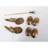 Two pairs of 9ct gold cufflinks and a pearl tie pin claw set in yellow metal (3)