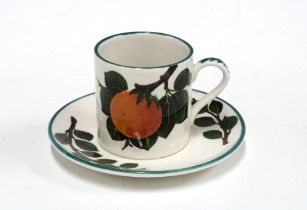 Griselda Hill Pottery cup and saucer painted with oranges pattern (2) 13cm.