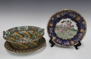 Chinese famille rose pierced basket and stand and a plate with blue and gilt border (2) 30cm.