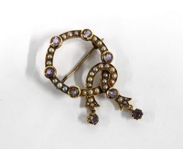Late 19th / early 20th century amethyst and pearl brooch, set in unmarked yellow metal, approx 4.5cm