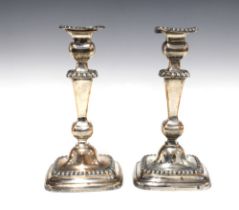 A pair of silver plate on copper knop stem candlesticks, (2) 14 x 26cm.