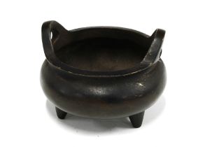 Chinese bronze two handled censor, bears character marks to base, 13 x 9cm.
