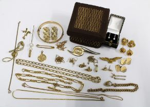 A quantity of gold plated and gilt metal costume jewellery together with a pair of paste set drop