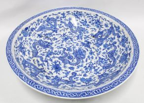 Large Chinese blue and white dragon bowl, with five clawed dragons chasing pearls of wisdom, (A/F
