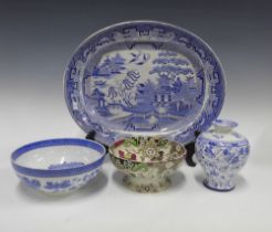 Staffordshire transfer printed Willow pattern ashet, 47 x 38cm, together with a Willow pattern bowl,