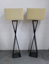 Pair of modern X-frame standard lamps and shades, 152 x 47cm. (2)