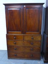 19th century mahogany linen press, projecting cornice over a pair of panel cupboard doors,