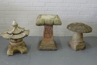 Garden ornaments to include a toadstool, pagoda and table, 37 x 52cm. (3)