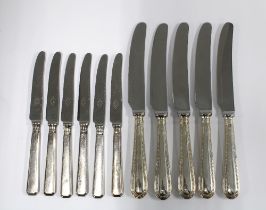 Set of silver handled fruit knives and five silver handled table knives (11)