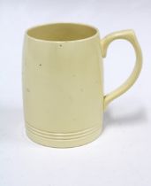 Keith Murray for wedgwood, a pottery tankard with facsimile signature to base, 14 x 12cm.