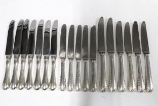 Set of seven Canadian silver handled knives together with eleven silver handled knives marked 930 (